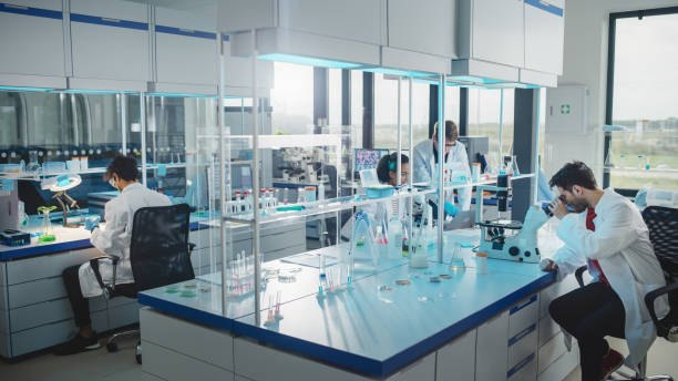 Laboratory technicians analysing product samples